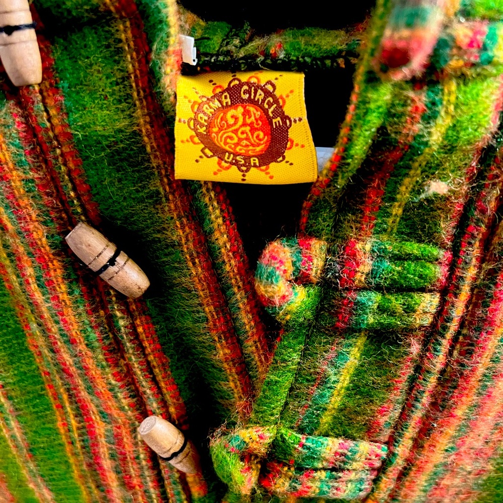 KARMA CIRCLE USA Jamaican Poncho Hoodie with front pockets.